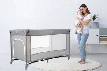 Дитяче складне ліжечко-манеж Moby-System Happy Traveller Basic з розкладним матрацом, сумкою, коліщатками та бічним виходом, 126 x 66 см 5094763 фото