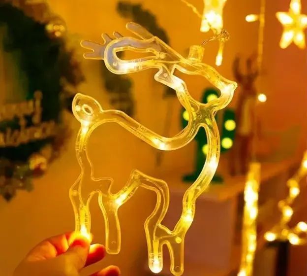 Гірлянда Штора з формами дзвіночок, ялинка, олень 12 PCS light pr0481911 фото