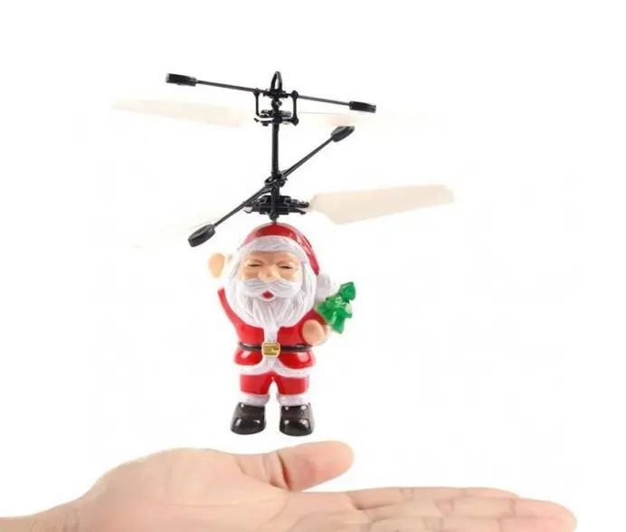 Літаюча іграшка Flying Santa літаючий Дід Мороз Cанта Клаус 80122564 фото
