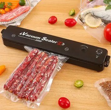 Вакуумний пакувальник для кухні чорний Вакууматор побутовий vacuum sealer Продуктовий вакуумний пакувальник для дому 37372 фото