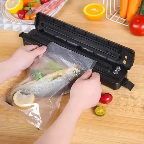 Вакуумний пакувальник для кухні чорний Вакууматор побутовий vacuum sealer Продуктовий вакуумний пакувальник для дому 37372 фото